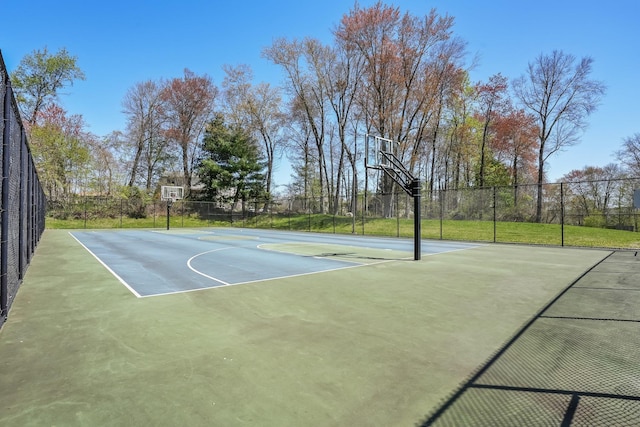 view of sport court with community basketball court and fence