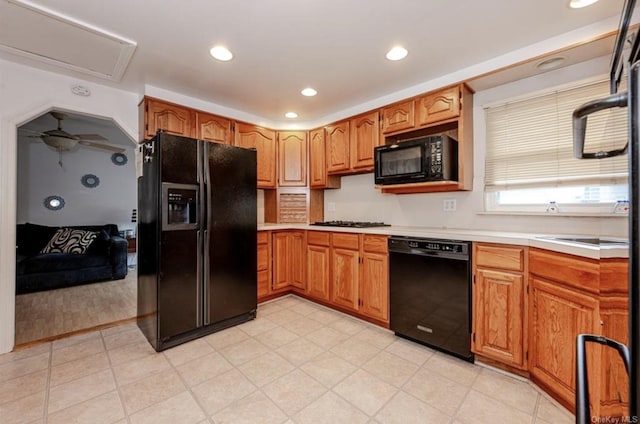 33 Alden Park Unit 33, Bronx, NY 10465 - kitchen featuring light countertops, brown cabinets, black appliances, and recessed lighting