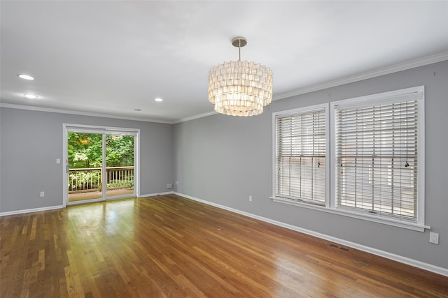 149 King St Unit 15, Chappaqua, NY 10514 - empty room with a chandelier, ornamental molding, baseboards, wood finished floors, and recessed lighting