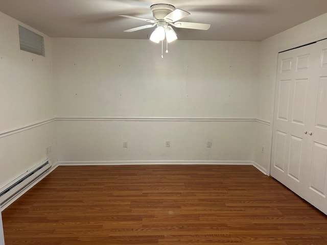 149 King St Unit 15, Chappaqua, NY 10514 - empty room featuring a ceiling fan, wood finished floors, a baseboard heating unit, and baseboards