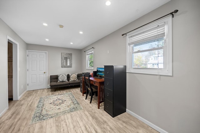 home office featuring recessed lighting, baseboards, and light wood finished floors