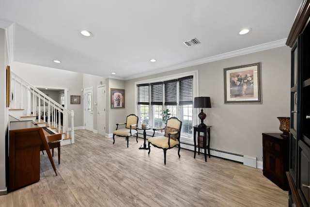 living area with visible vents, baseboards, ornamental molding, stairs, and light wood-style flooring