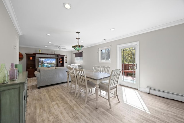 dining space featuring ornamental molding, a baseboard radiator, recessed lighting, a ceiling fan, and light wood-style flooring