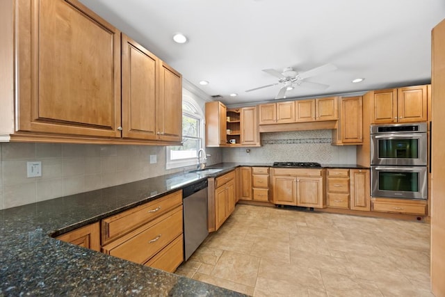 kitchen with tasteful backsplash, open shelves, a sink, dark stone counters, and stainless steel appliances