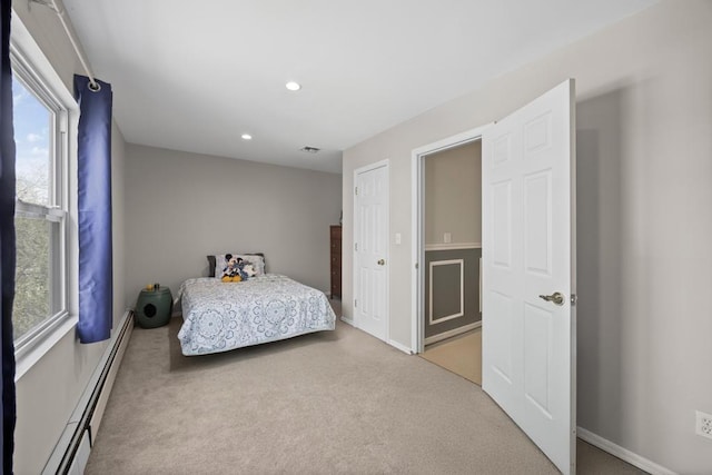 carpeted bedroom featuring baseboards, a baseboard radiator, multiple windows, and recessed lighting