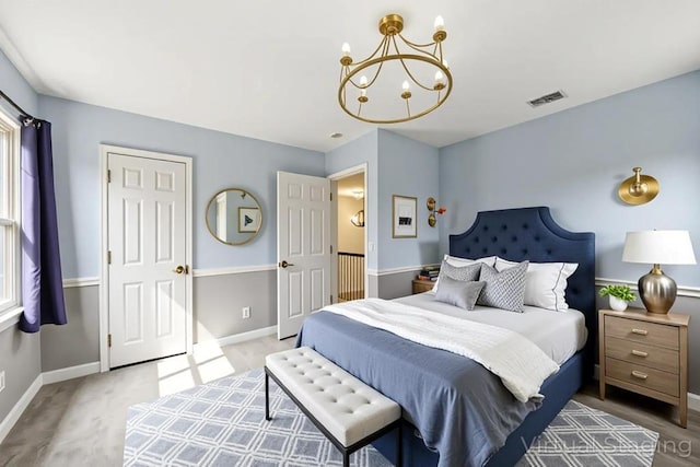 4 Ficus St, Port Jefferson Station, NY 11776 - bedroom featuring a chandelier and baseboards