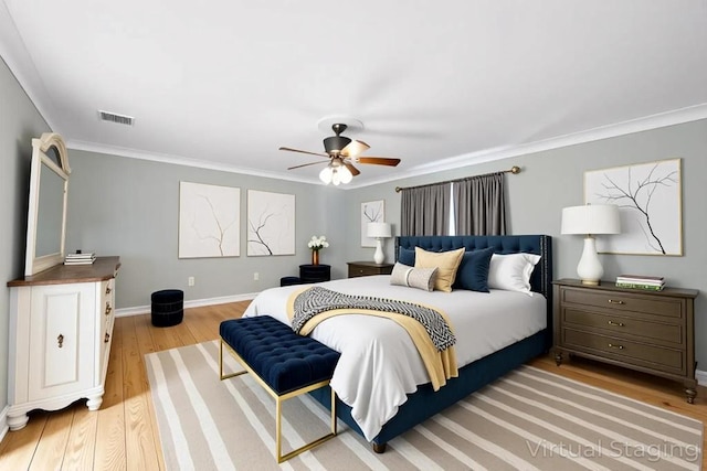 4 Ficus St, Port Jefferson Station, NY 11776 - bedroom featuring light wood-style flooring, crown molding, baseboards, and a ceiling fan