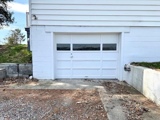 garage with driveway