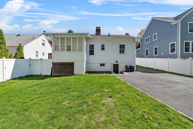 15 Elmore Ave, Croton-On-Hudson, NY 10520 - rear view of house with a yard, a fenced backyard, a gate, and a chimney