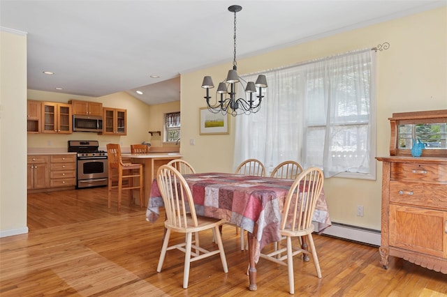 2 Heather Dr, Remsenburg, NY 11960 - dining area with baseboard heating, recessed lighting, an inviting chandelier, vaulted ceiling, and light wood-style floors