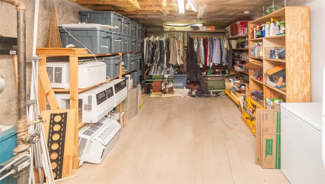 storage featuring washer / dryer