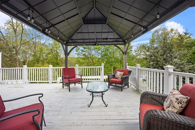 wooden deck with a gazebo