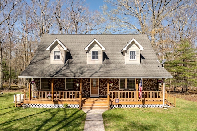 83 Split Rock Dr, Barryville, NY 12719 - view of front facade featuring a porch, roof with shingles, a front yard, and stone siding