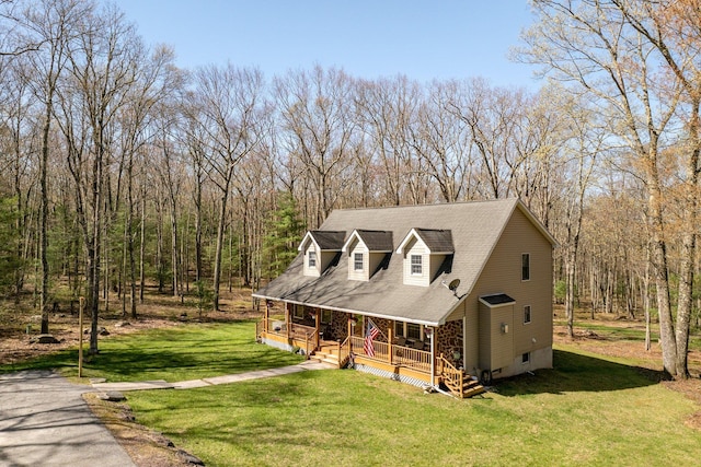 83 Split Rock Dr, Barryville, NY 12719 - view of front of home with a view of trees, covered porch, and a front yard