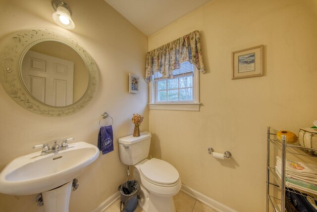 83 Split Rock Dr, Barryville, NY 12719 - bathroom featuring baseboards, a sink, tile patterned flooring, and toilet