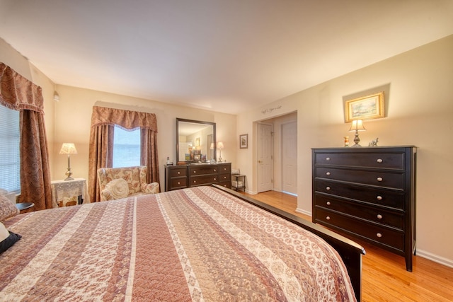 83 Split Rock Dr, Barryville, NY 12719 - bedroom with baseboards and wood finished floors