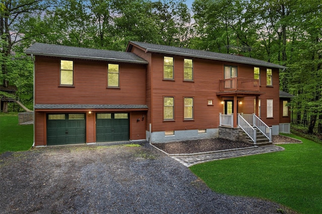 14 Still Hollow Rd, Newburgh, NY 12550 - view of front of property featuring an attached garage, a balcony, a front yard, asphalt driveway, and roof with shingles