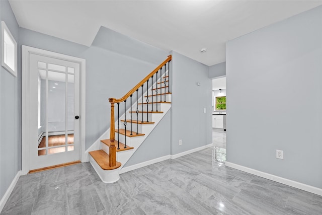 14 Still Hollow Rd, Newburgh, NY 12550 - stairway with a baseboard radiator, marble finish flooring, and baseboards