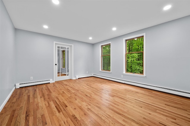 14 Still Hollow Rd, Newburgh, NY 12550 - empty room with a baseboard radiator, wood finished floors, recessed lighting, and baseboards