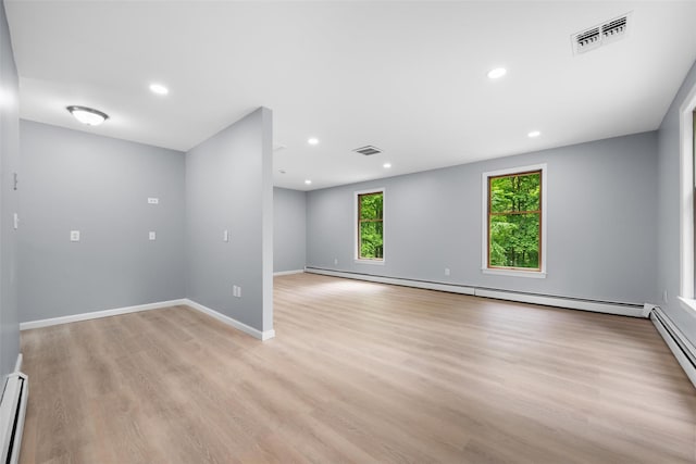 14 Still Hollow Rd, Newburgh, NY 12550 - unfurnished room with light wood-type flooring, baseboard heating, recessed lighting, and baseboards