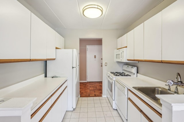 372 Central Park Ave Unit 3U, Scarsdale, NY 10583 - kitchen with white appliances, light countertops, white cabinets, and a sink
