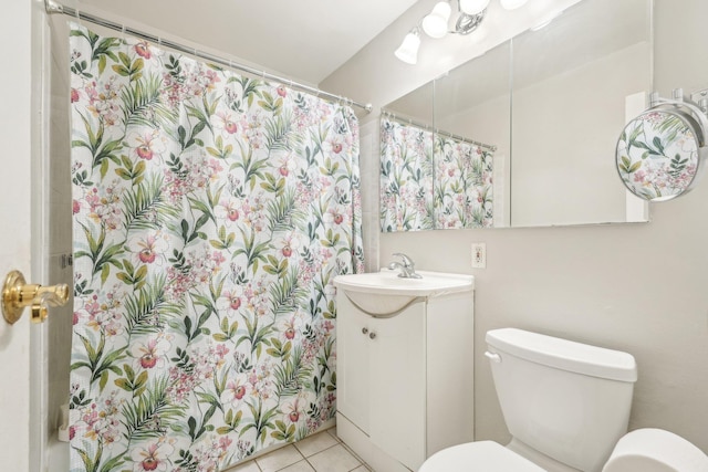 372 Central Park Ave Unit 3U, Scarsdale, NY 10583 - full bath with toilet, vanity, tile patterned flooring, and a shower with shower curtain