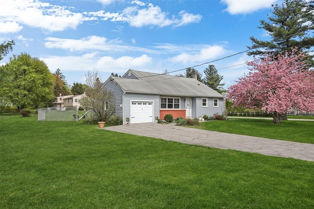 single story home with driveway, fence, a garage, a shingled roof, and a front lawn