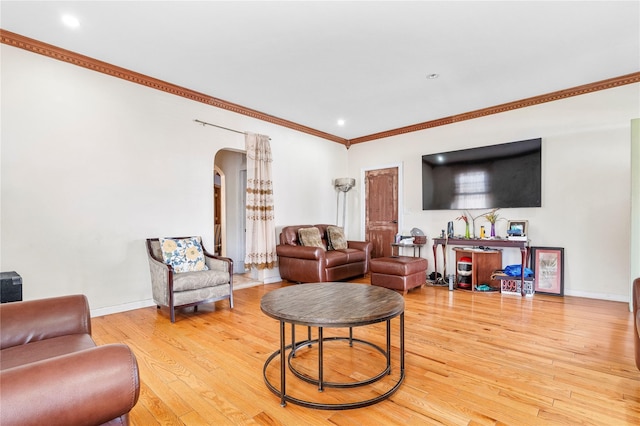 142 Primrose Ave, Mount Vernon, NY 10552 - living area featuring wood-type flooring, crown molding, baseboards, recessed lighting, and arched walkways