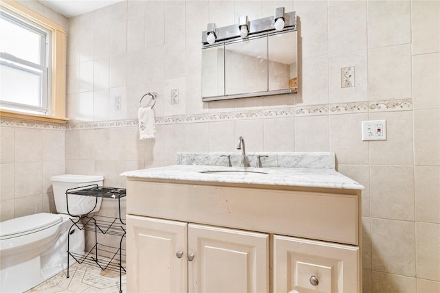 142 Primrose Ave, Mount Vernon, NY 10552 - bathroom with toilet, tile walls, tile patterned flooring, and vanity
