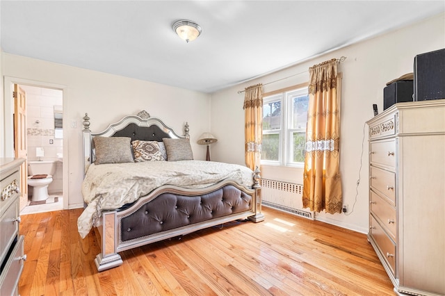 142 Primrose Ave, Mount Vernon, NY 10552 - bedroom featuring ensuite bathroom, light wood finished floors, and radiator