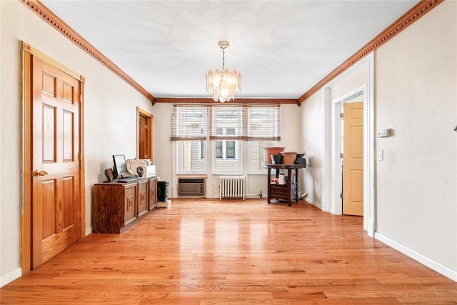 142 Primrose Ave, Mount Vernon, NY 10552 - dining area featuring light wood-style floors, radiator, and crown molding