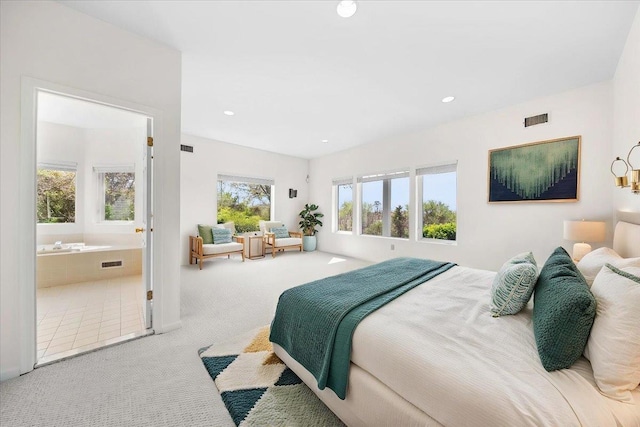 bedroom with carpet, recessed lighting, and visible vents