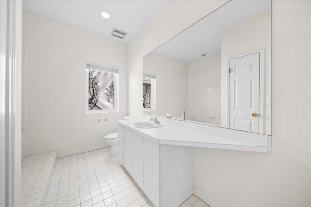 bathroom featuring visible vents, tile patterned flooring, vanity, toilet, and baseboards