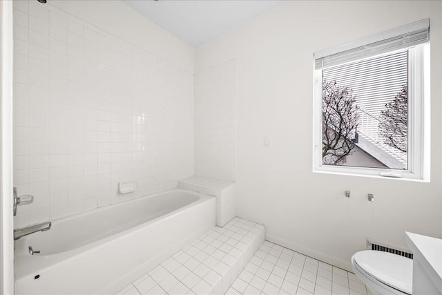 bathroom featuring toilet and tile patterned floors
