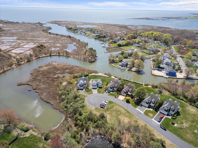 aerial view with a residential view and a water view