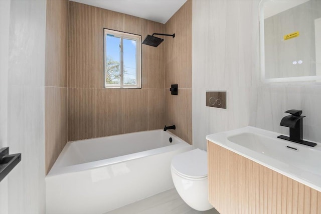 full bathroom with vanity, toilet, and  shower combination