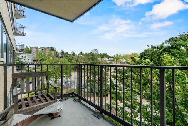 balcony featuring a residential view
