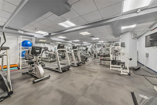 workout area with a drop ceiling