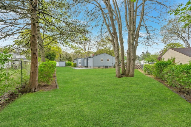 view of yard featuring fence