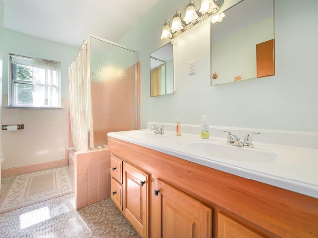 full bathroom with tile patterned flooring, a sink, shower / bath combination with curtain, and double vanity