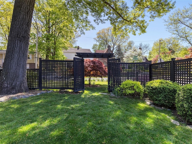 view of yard featuring fence