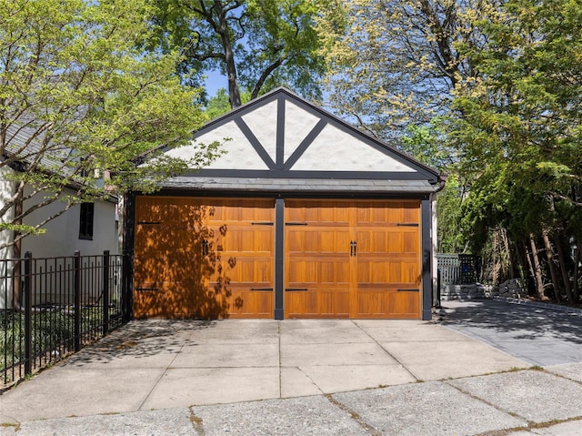 detached garage with fence