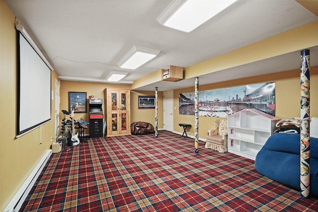 interior space with baseboards, carpet, and a baseboard heating unit