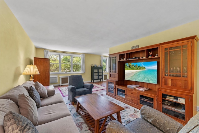 76 Dehaven Dr Unit 3D, Yonkers, NY 10703 - living area with a wall mounted AC and wood finished floors
