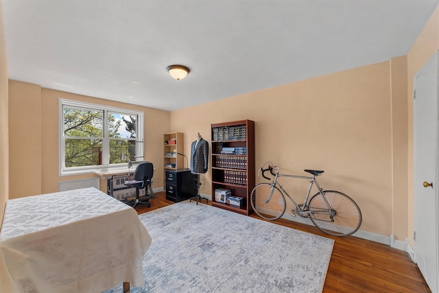 76 Dehaven Dr Unit 3D, Yonkers, NY 10703 - bedroom featuring baseboards and dark wood-style floors