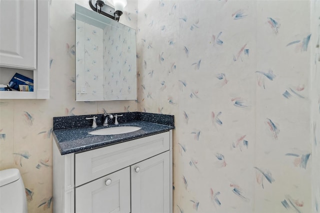 76 Dehaven Dr Unit 3D, Yonkers, NY 10703 - bathroom with vanity, toilet, and wallpapered walls