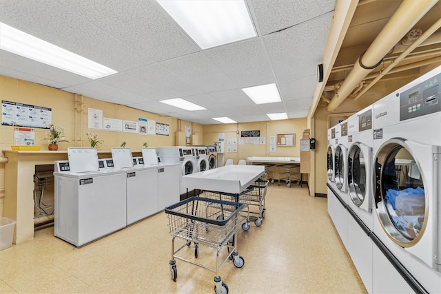 76 Dehaven Dr Unit 3D, Yonkers, NY 10703 - common laundry area with washer and dryer and light floors