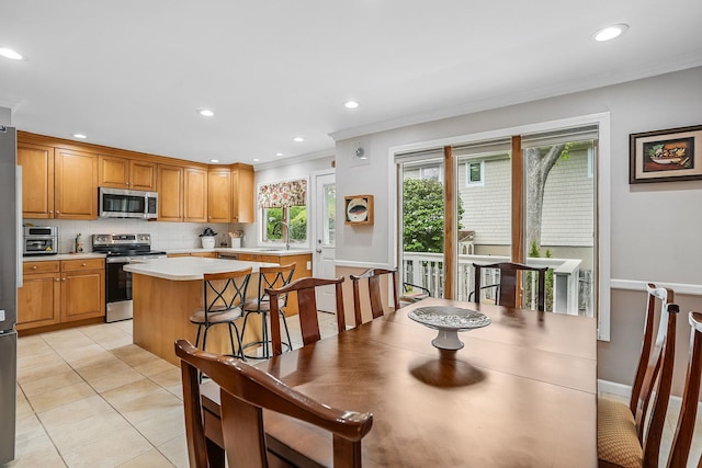 4 Sylvan Rd, White Plains, NY 10605 - dining room with crown molding, recessed lighting, and light tile patterned flooring
