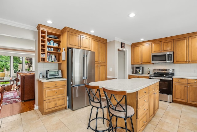 4 Sylvan Rd, White Plains, NY 10605 - kitchen with appliances with stainless steel finishes, open shelves, crown molding, light countertops, and recessed lighting