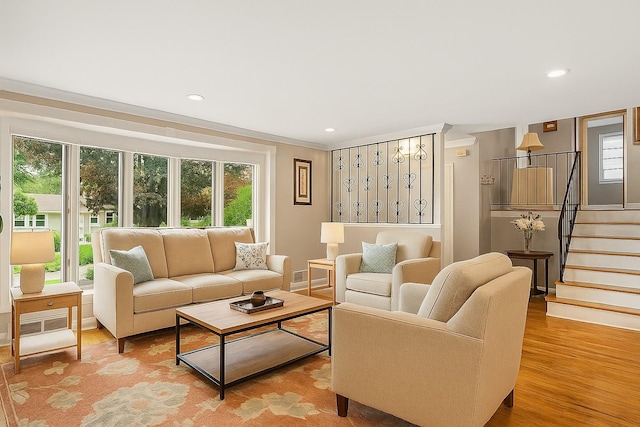 4 Sylvan Rd, White Plains, NY 10605 - living room featuring plenty of natural light, crown molding, light wood-style flooring, recessed lighting, and stairs